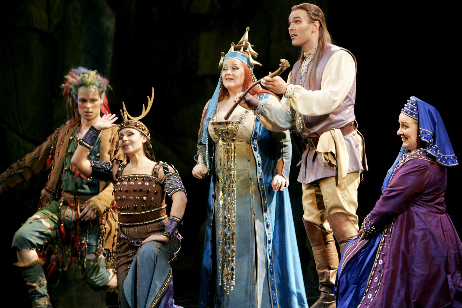 Petrus Schroderus plays Prince Tamino in Mozart’s Magic Flute, singing onstage with four other costumed opera singers.